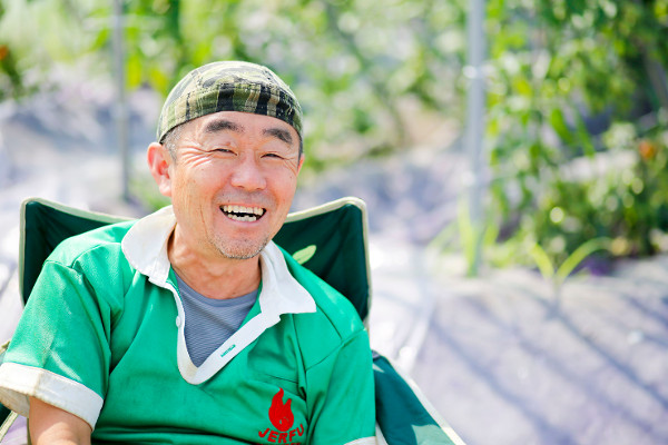 笑顔で話す佐々木敬仁さん